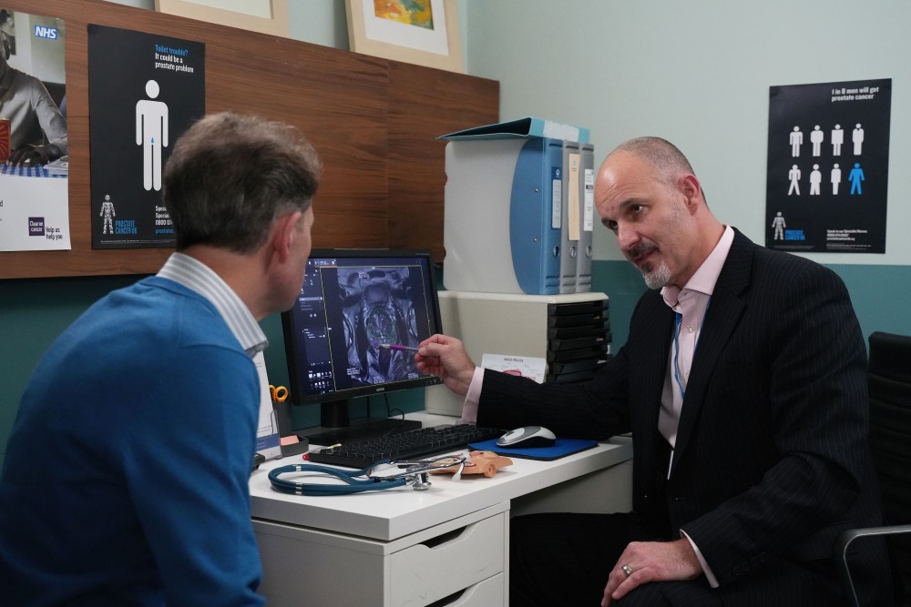 Gp And Patient With Mri Scan
